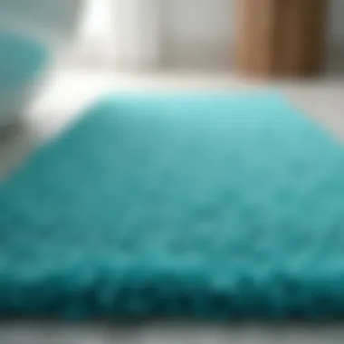 Close-up of the texture and material of a teal bath rug